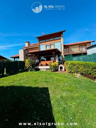 Foto 1 de Casa adossada en venda a urbanización Mirador de Somio de 4 habitacions amb terrassa i garatge
