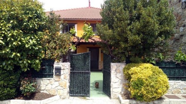 Foto 1 de Casa en venda a calle Sol de 5 habitacions amb garatge i jardí