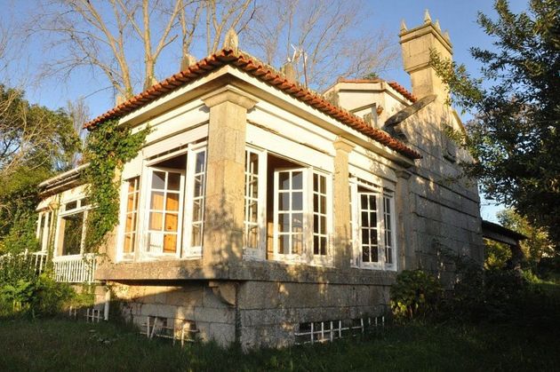 Foto 1 de Venta de chalet en Alcabre - Navia - Comesaña de 4 habitaciones con terraza y jardín