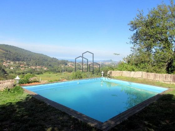 Foto 1 de Casa en venda a Gondomar de 5 habitacions amb piscina i jardí