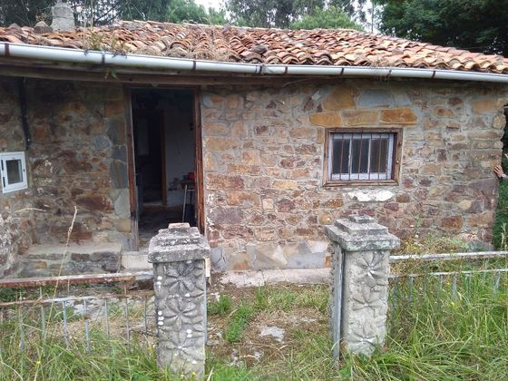 Foto 1 de Casa rural en venta en calle Soto del Barco de 2 habitaciones con jardín