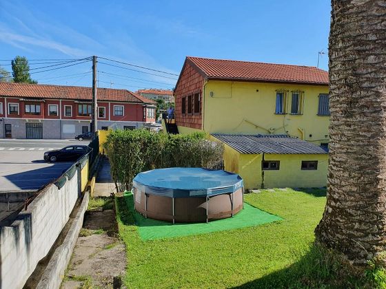 Foto 1 de Casa adosada en venta en Igollo de 4 habitaciones con terraza y piscina