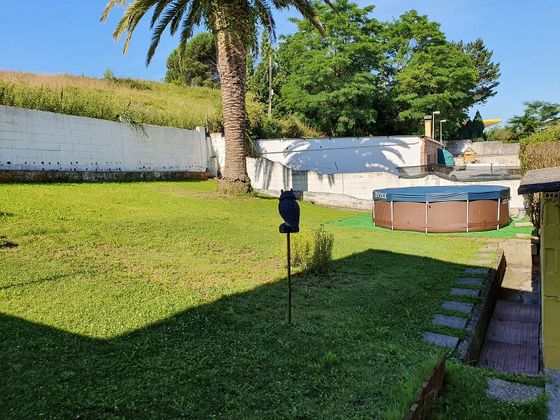 Foto 2 de Casa adossada en venda a Igollo de 4 habitacions amb terrassa i piscina