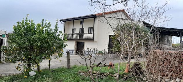 Foto 1 de Venta de casa rural en Ribamontán al Monte de 4 habitaciones con terraza y jardín