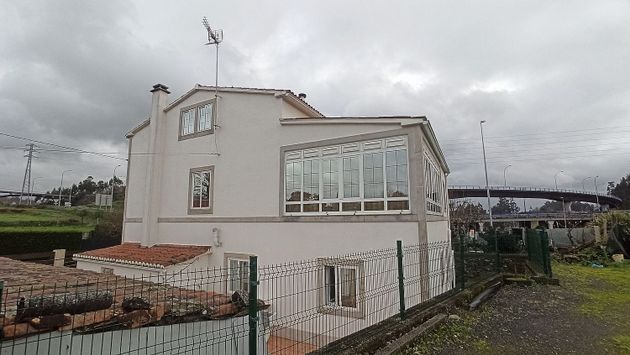Foto 1 de Casa en venda a Castiñeiriño - Cruceiro de Sar de 8 habitacions amb terrassa i garatge