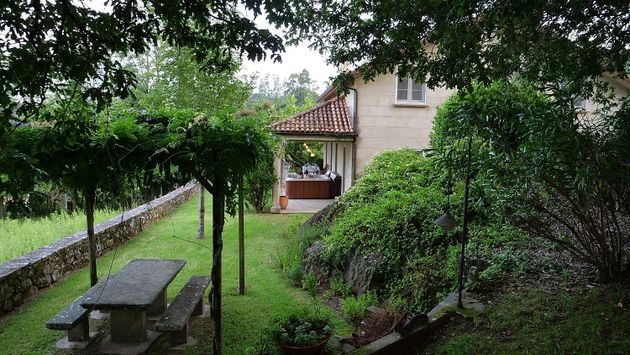 Foto 1 de Xalet en venda a Brión de 6 habitacions amb terrassa i garatge