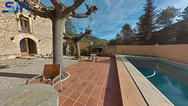 Foto 1 de Casa rural en venda a Pontons de 10 habitacions amb terrassa i piscina
