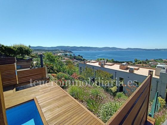 Foto 1 de Casa adosada en venta en Sanxenxo de 4 habitaciones con terraza y piscina