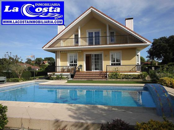 Foto 2 de Chalet en venta en Somo de 4 habitaciones con terraza y piscina