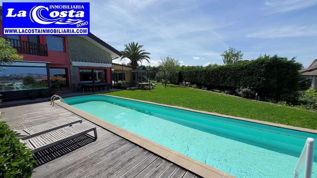 Foto 1 de Casa en venda a Somo de 5 habitacions amb terrassa i piscina