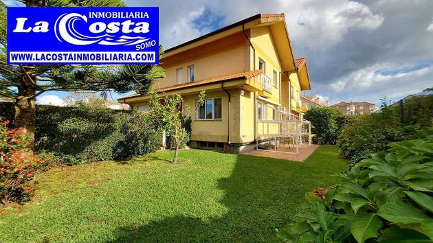 Foto 1 de Casa adossada en venda a Galizano de 4 habitacions amb terrassa i garatge
