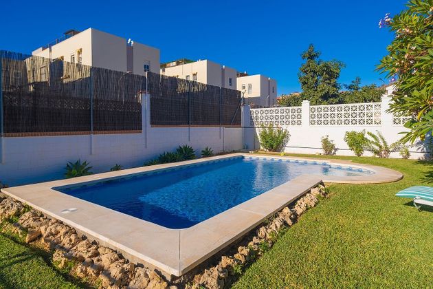 Foto 1 de Venta de chalet en Cotomar - Urbanizaciones de 5 habitaciones con terraza y piscina