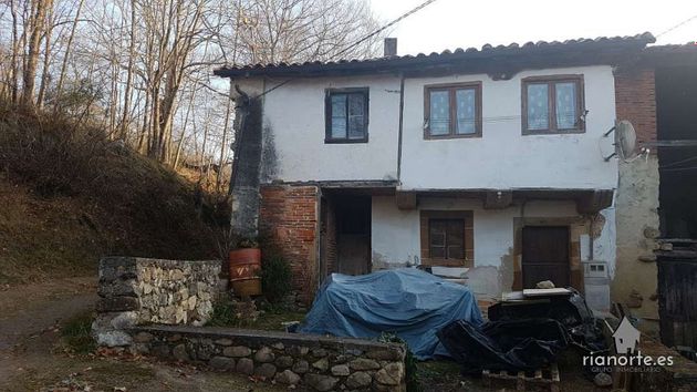 Foto 1 de Venta de casa adosada en Cangas de Onís de 2 habitaciones con terraza y jardín