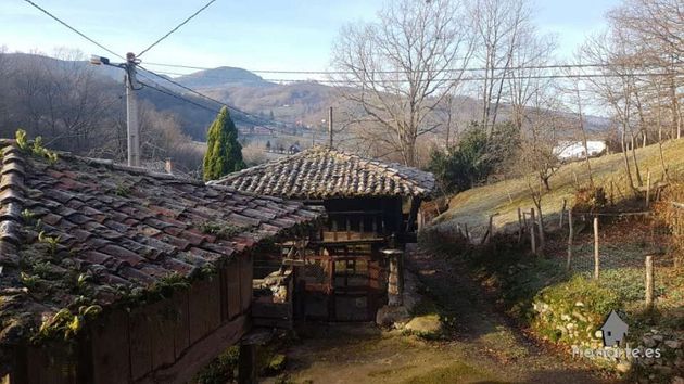 Foto 2 de Venta de casa adosada en Cangas de Onís de 2 habitaciones con terraza y jardín
