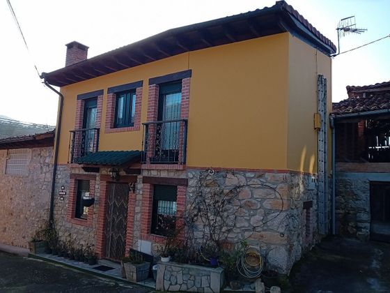 Foto 2 de Venta de casa adosada en calle Mestas de Con de 2 habitaciones con jardín y calefacción