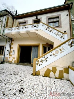 Foto 1 de Casa adosada en venta en Sama de 2 habitaciones con terraza y garaje