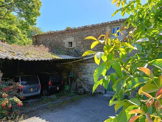 Foto 1 de Casa adossada en venda a Cesuras de 3 habitacions amb garatge i jardí