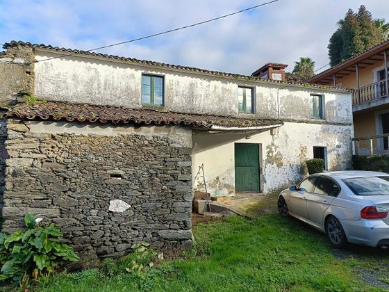 Foto 2 de Casa adossada en venda a Cesuras de 4 habitacions amb terrassa i garatge