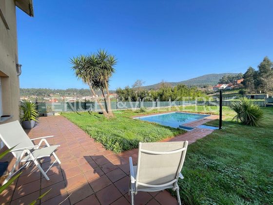 Foto 1 de Xalet en venda a O Carril - Bamio de 4 habitacions amb terrassa i piscina