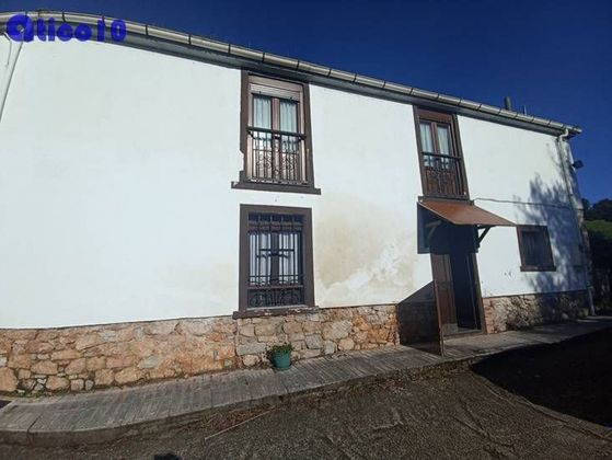 Foto 1 de Casa adossada en venda a Parroquias Norte de 3 habitacions amb garatge i calefacció