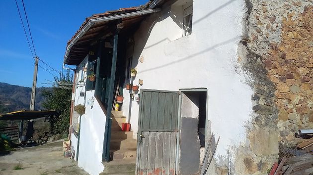 Foto 1 de Venta de casa adosada en calle Valbuena de 2 habitaciones con jardín y calefacción