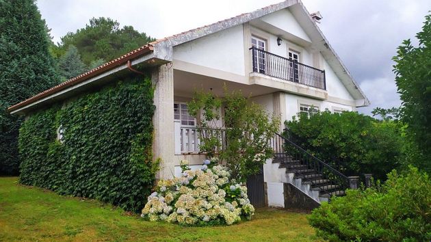 Foto 1 de Casa en venda a Brión de 7 habitacions amb terrassa i piscina