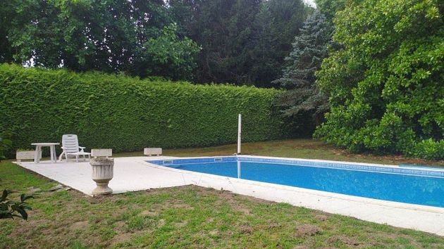 Foto 2 de Casa en venta en Brión de 7 habitaciones con terraza y piscina