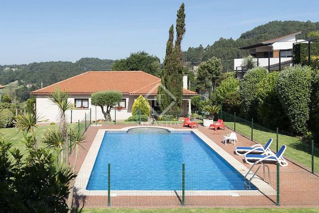 Foto 1 de Casa en venda a Gondomar de 4 habitacions amb terrassa i piscina