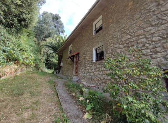 Foto 2 de Casa adossada en venda a Mioño - Santullán de 4 habitacions amb jardí i calefacció