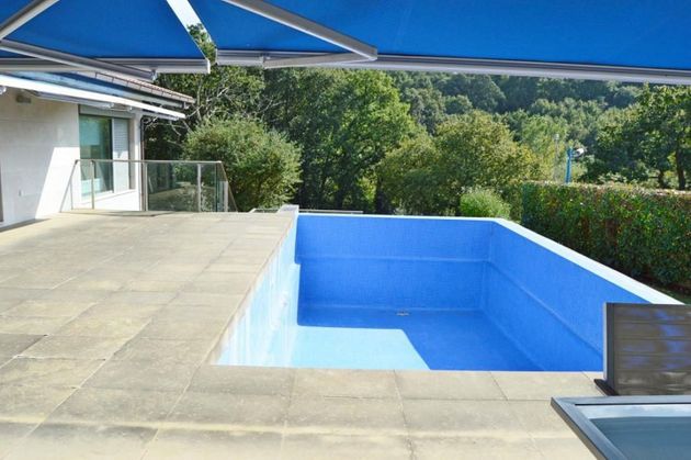 Foto 2 de Xalet en venda a urbanización La Cabaña de 4 habitacions amb terrassa i piscina