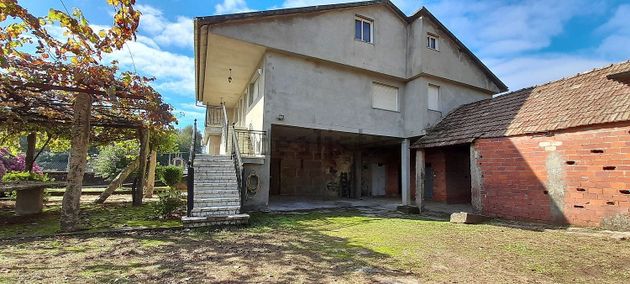 Foto 1 de Casa en venda a Mos de 4 habitacions amb terrassa i garatge