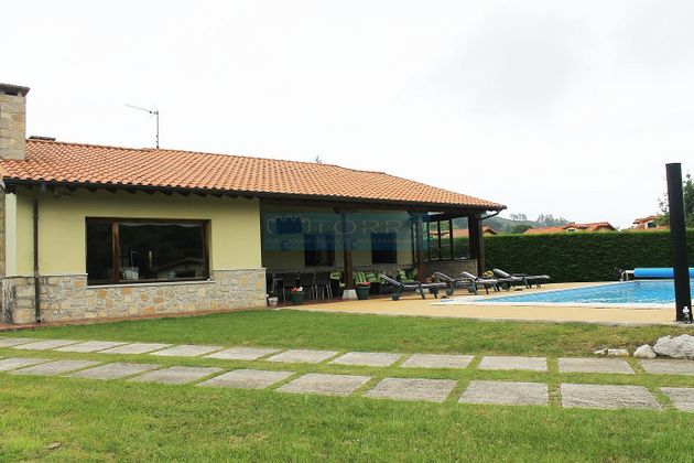 Foto 1 de Venta de casa en Cué-San Roque-Andrín de 4 habitaciones con piscina y jardín