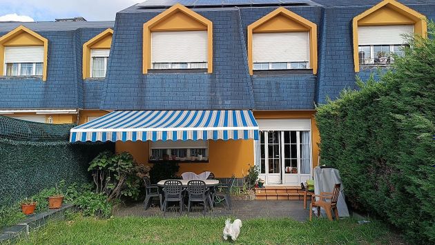 Foto 1 de Casa adosada en venta en Viella-Granda-Meres de 5 habitaciones con terraza y garaje