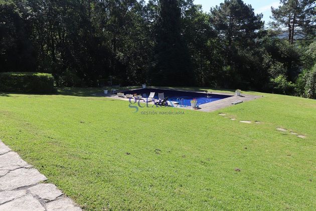 Foto 2 de Venta de chalet en Urduliz de 6 habitaciones con terraza y piscina