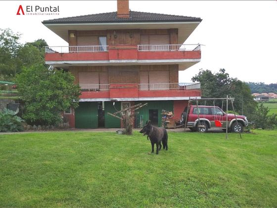 Foto 1 de Casa rural en venta en Voto de 8 habitaciones con terraza y garaje