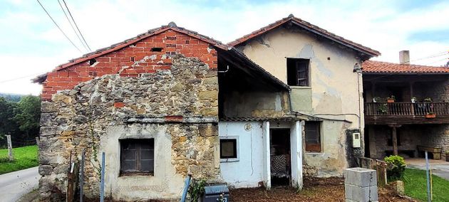 Foto 1 de Casa adossada en venda a Parroquias Norte de 3 habitacions amb terrassa i jardí