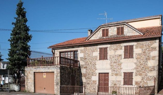 Foto 1 de Casa en venda a Boiro de 4 habitacions amb terrassa i garatge