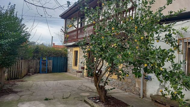 Foto 2 de Casa en venta en Marina de Cudeyo de 4 habitaciones con terraza y jardín