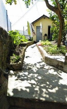 Foto 2 de Casa adossada en venda a Valdés de 3 habitacions amb terrassa i garatge