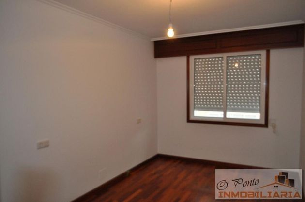 Foto 2 de Venta de piso en A Gándara de 2 habitaciones con garaje y calefacción