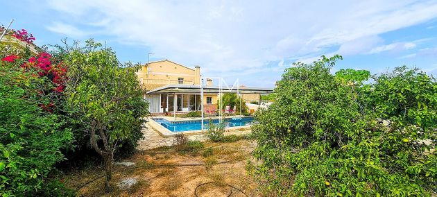 Foto 1 de Venta de chalet en Algar de Palancia de 5 habitaciones con terraza y piscina