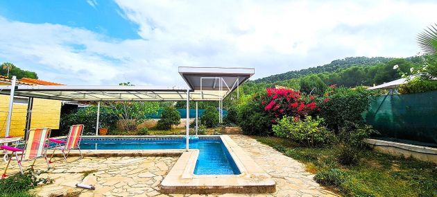 Foto 2 de Venta de chalet en Algar de Palancia de 5 habitaciones con terraza y piscina