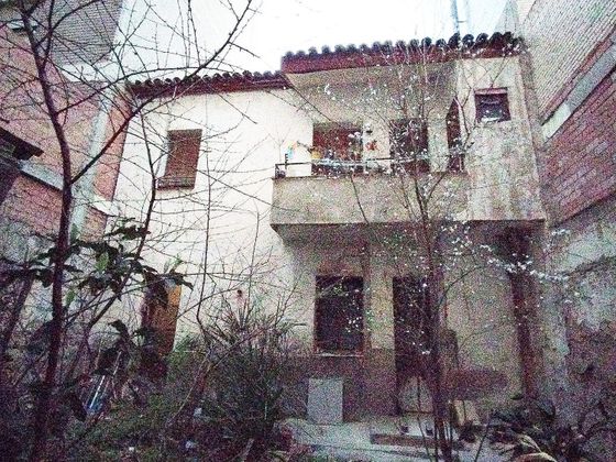 Foto 1 de Xalet en venda a La Almozara de 3 habitacions amb jardí