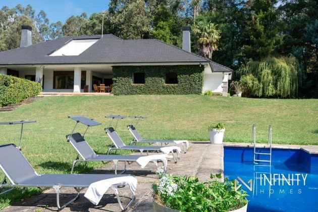 Foto 1 de Casa en venda a Urduliz de 6 habitacions amb terrassa i piscina