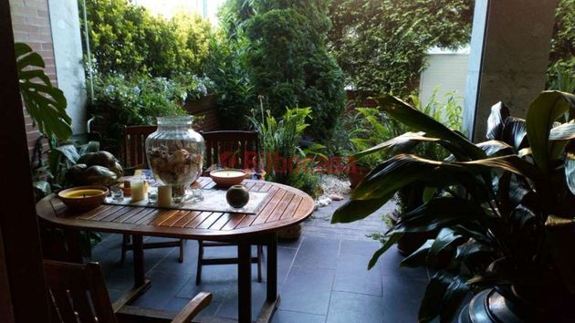 Foto 1 de Casa adosada en venta en Ortuella de 4 habitaciones con terraza y piscina