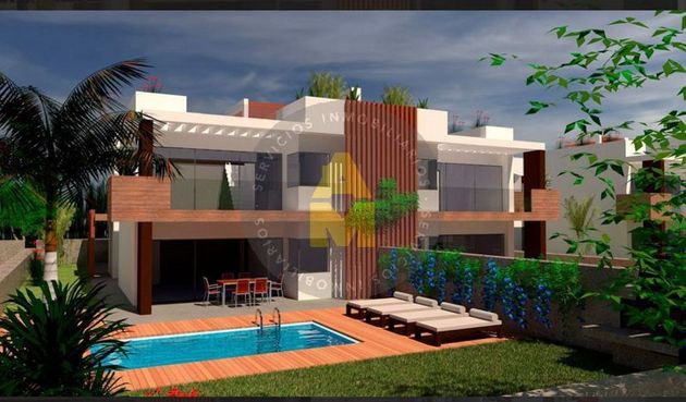 Foto 1 de Casa adosada en venta en Miño de 4 habitaciones con terraza y piscina