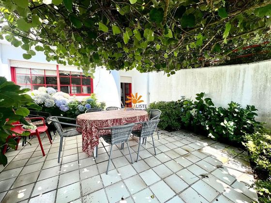 Foto 1 de Venta de casa adosada en avenida Luis Rocafort de 5 habitaciones con terraza y piscina