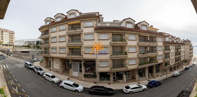 Foto 1 de Piso en venta en Sanxenxo de 4 habitaciones con terraza y garaje