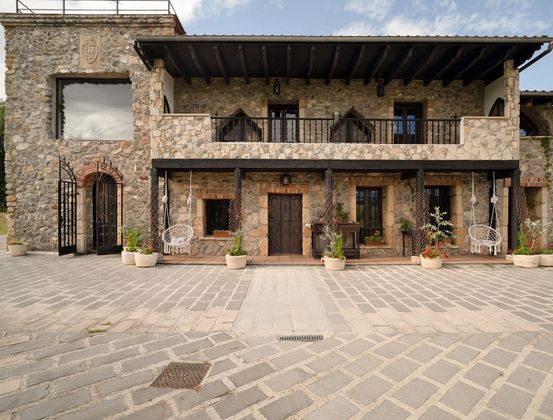 Foto 1 de Casa en venda a Parroquias Norte de 7 habitacions amb terrassa i garatge