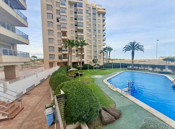 Foto 1 de Venta de ático en Guardamar Playa de 3 habitaciones con terraza y piscina